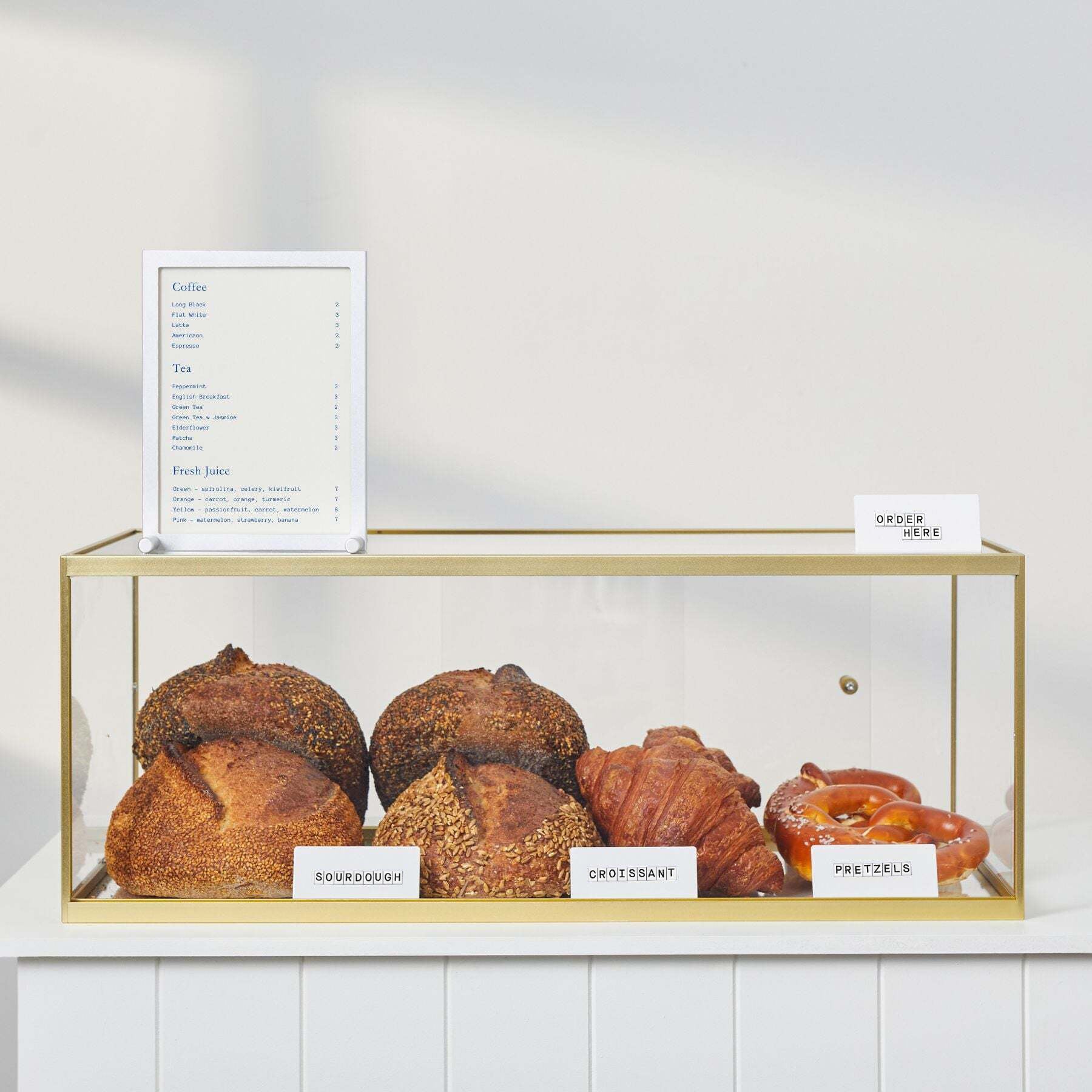 brass regular-sized acrylic bakery pastry display cabinet
