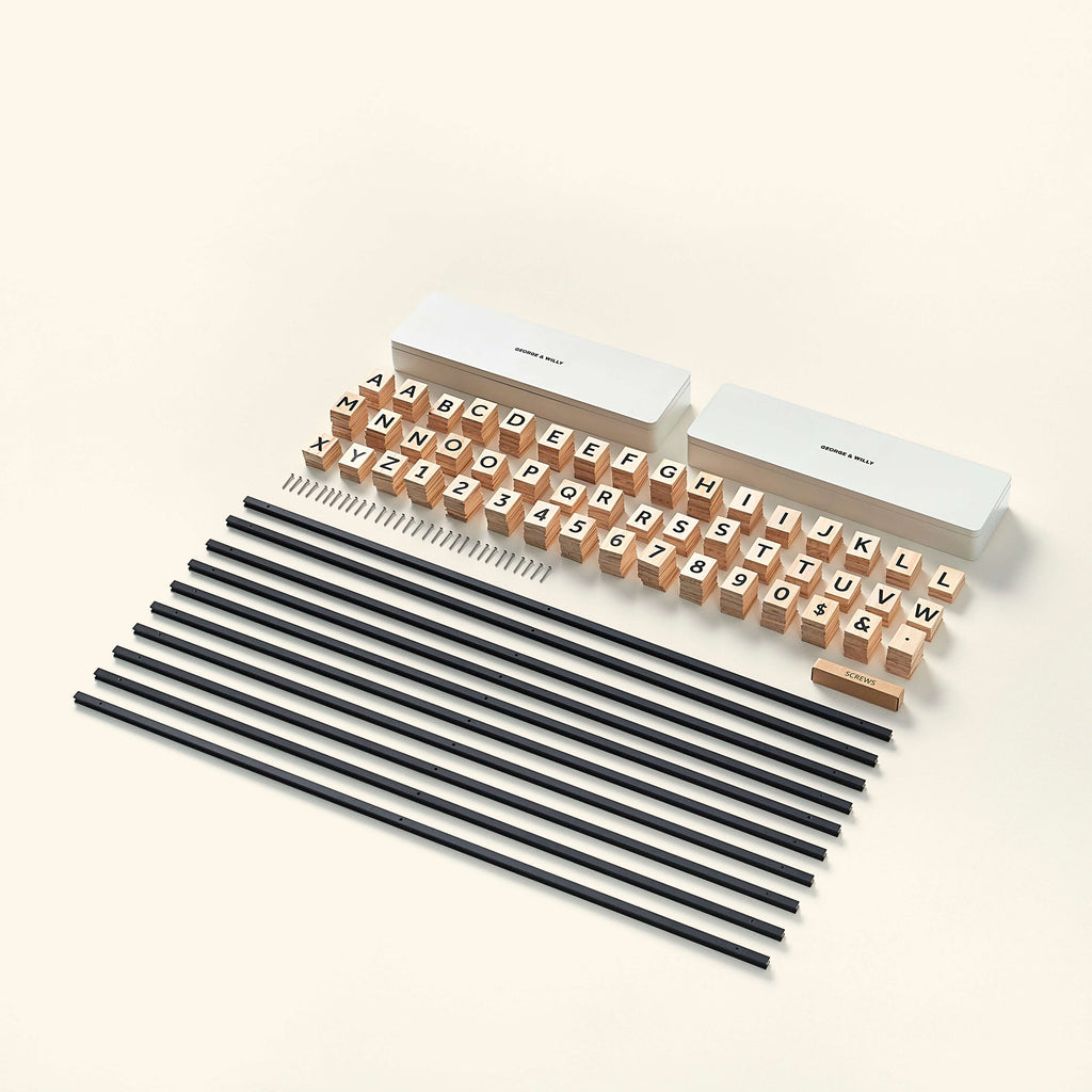 The components of the George & Willy Wooden Letter Board laid out against a cream background